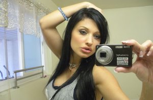 18 year old female boxer Sabrina Blond covers up her naked tits